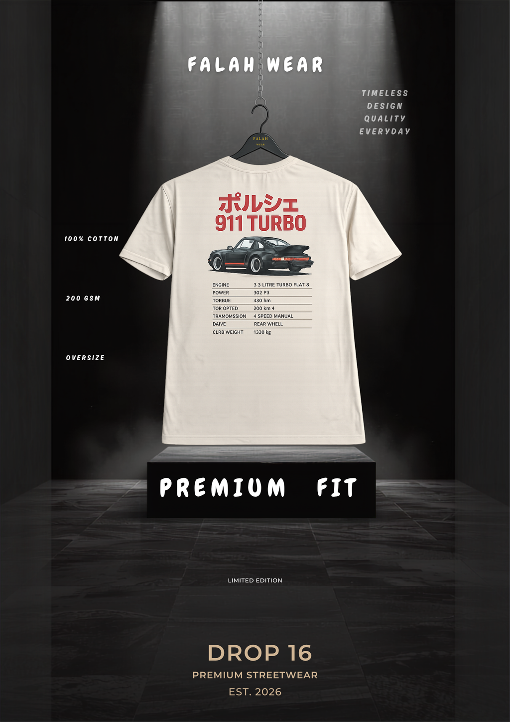 A white short-sleeve T-shirt hanging on a black hanger against a dark spotlighted background. The shirt has red Japanese text reading '911 TURBO' above a small car graphic and a black technical-style spec print below.