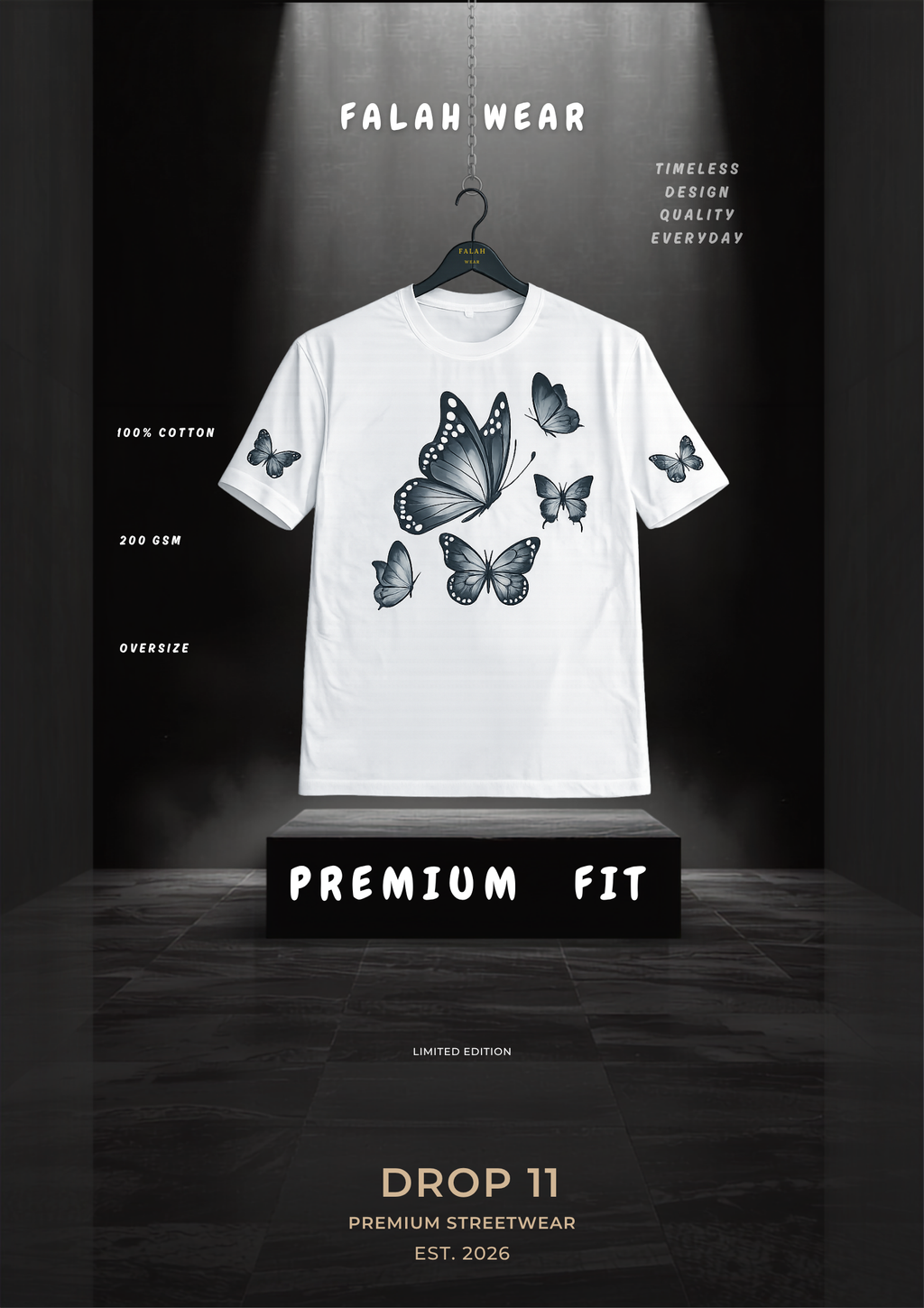 A white short-sleeve t-shirt with a black butterfly graphic print on the front, hanging on a black hanger against a dark, dramatic studio backdrop. The brand name 'FALAH WEAR' is displayed at the top, and the t-shirt is presented on a black pedestal labeled 'PREMIUM FIT'.