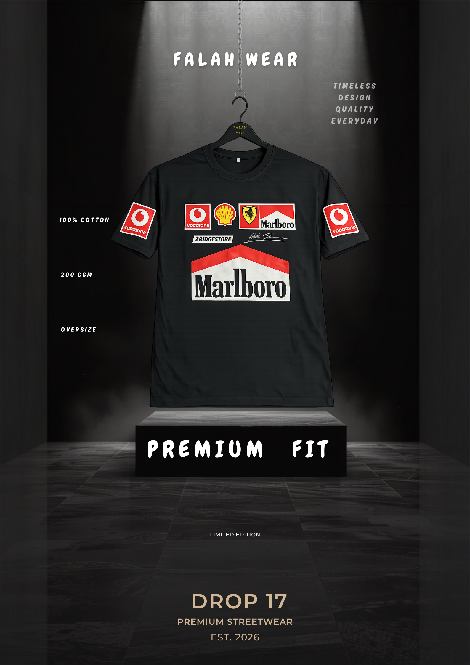 A black short-sleeve t-shirt with a large Marlboro logo and various sponsor logos on the chest, displayed on a hanger above a pedestal in a dark studio setting. The text 'FALAH WEAR' and 'PREMIUM FIT' are visible on the image.